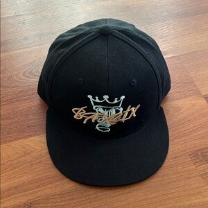 Black Snapback Hat with Embroidered Design from Bangin’ Designer Apparel